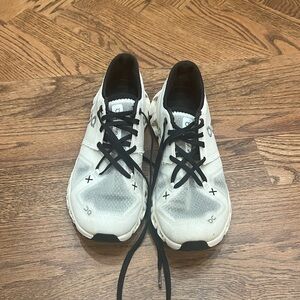 On cloud black and white sneakers